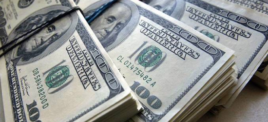 Як дії НБУ та міжнародна допомога можуть знизити курс долара